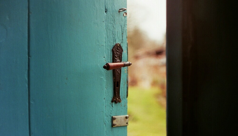 Old Turquoise Door Opening